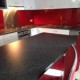 Great Look – Red Acrylic Splashback with Metaline insert behind the cooktop