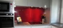 Red Acrylic Splashback with Induction Cooktop